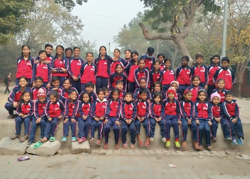 Group photo of African children supported by the profits made from Tongue Tie Academy courses